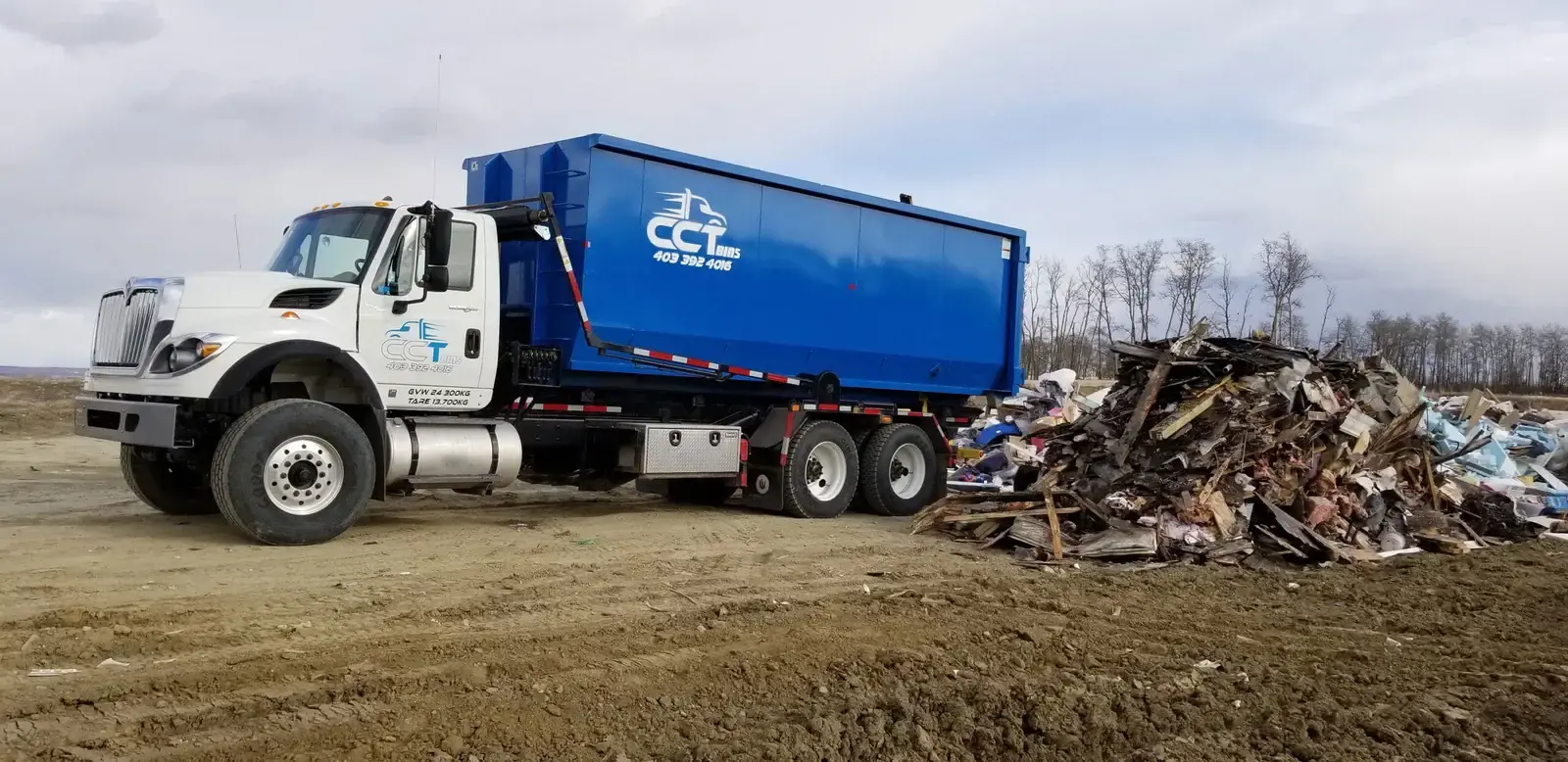 Professional dumpster rental trucks Red Deer Calgary Edmonton - CCT Bins Alberta waste disposal service